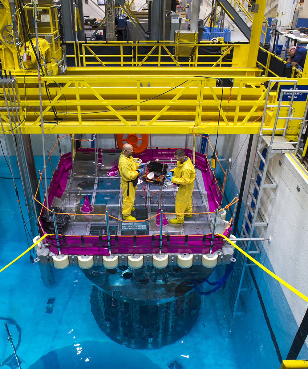 Team of Framatome professionals collaborating in a meeting, discussing project plans and innovations